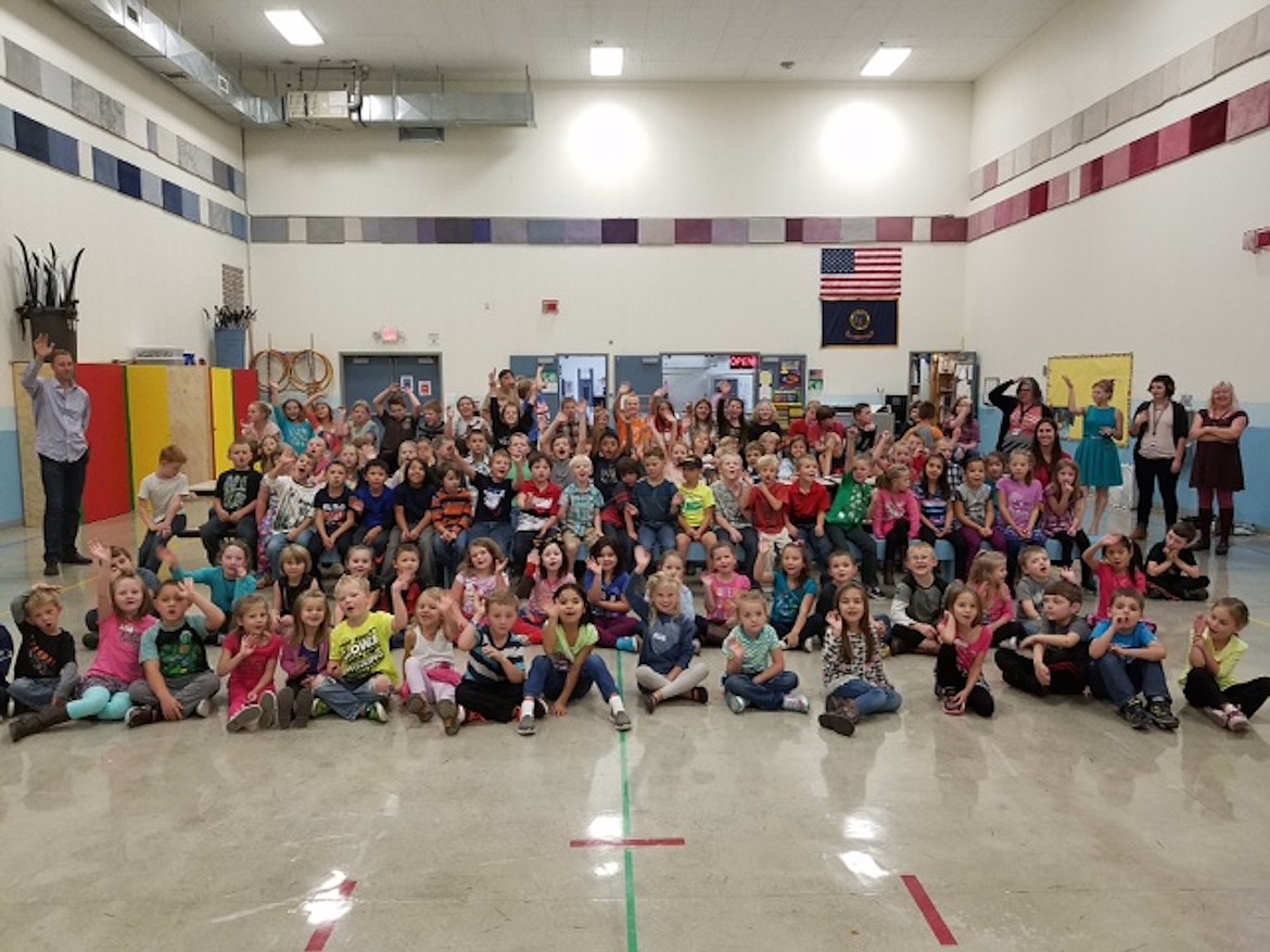 &#151;Courtesy photo
Naples Elementary students cheer for the camera on the first day of school.