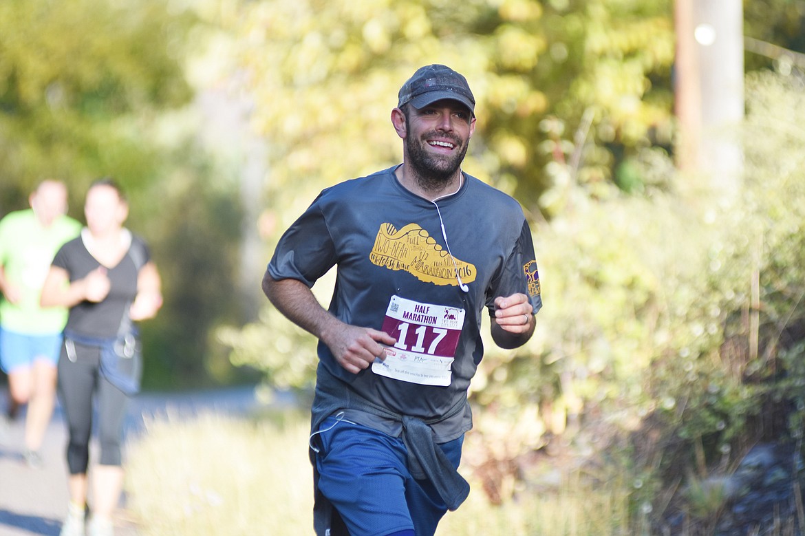 Jim Barber of Somers runs along East Lakeshore Drive Sunday during the half marathon for the Two Bear Marathon. Heidi Desch / Whitefish Pilot