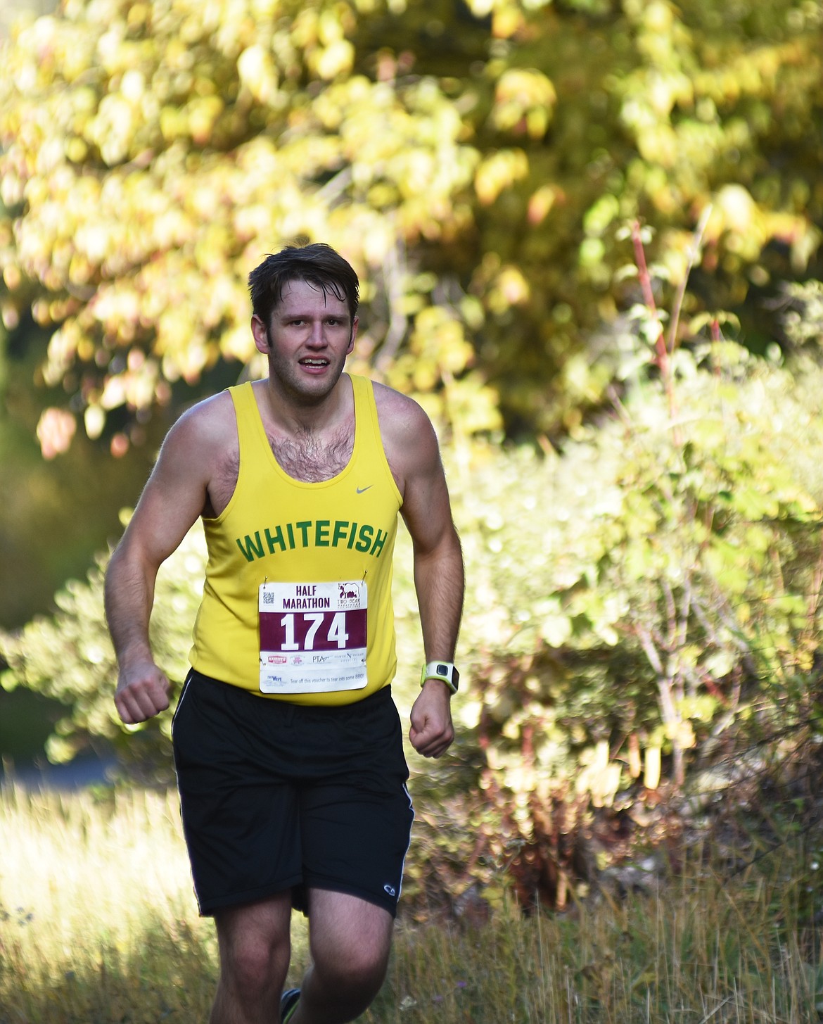 Shane Hanson of Whitefish runs along East Lakeshore Drive Sunday during the half marathon run of the Two Bear Marathon. Heidi Desch / Whitefish Pilot