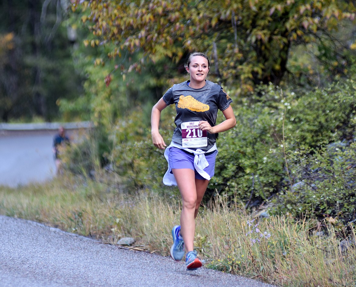 Katie Mckay of Spokane, Washington, runs along East Lakeshore during the half marathon Sunday in the Two Bear Marathon. Heidi Desch / Whitefish Pilot