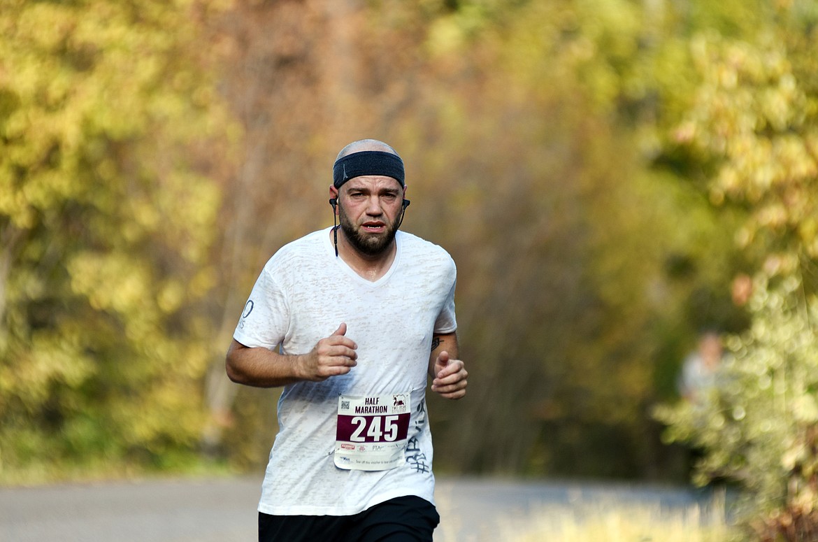 Ryan Pohlman, of Lynnwood, Washington, runs along East Lakeshore during the half marathon Sunday in the Two Bear Marathon. Heidi Desch / Whitefish Pilot