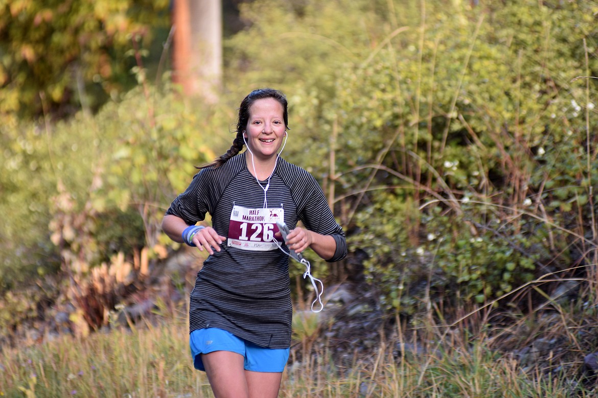 Danika Brandvold of Rossland, B.C. runs along East Lakeshore during the half marathon marathon Sunday in the Two Bear Marathon. Heidi Desch / Whitefish Pilot