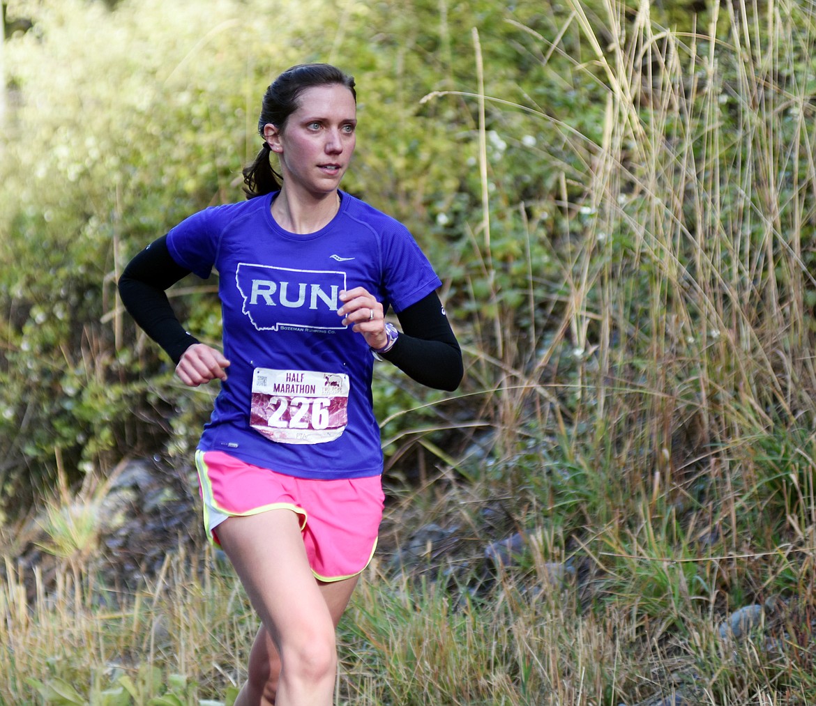 Samantha Modderman of Bigfork runs along East Lakeshore during the half marathon Sunday in the Two Bear Marathon. Heidi Desch / Whitefish Pilot