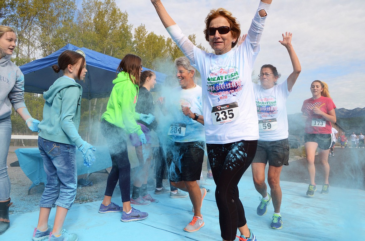 Matt Baldwin / Whitefish Pilot
Kathy Wram, Colleen Sullivan and Benilda Delgado are doused with colored powder in the Great Fish Color Run on Saturday in Whitefish. The 5k run was a benefit for the Whitefish Community Foundation&#146;s Great Fish Challenge.