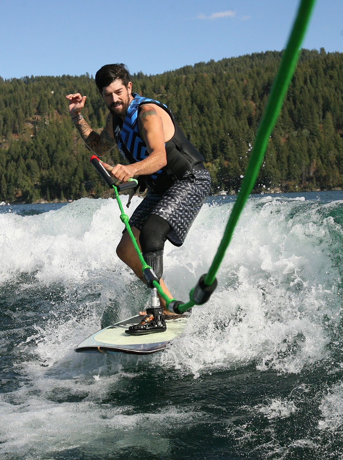 U.S. Paralympics snowboarding team training in Sandpoint

Keith Gabel, a 32 year-old from Ogden, Utah, enjoys some wake surfing on Friday on Lake Pend Oreille. Gabel is one of five members of the U.S. Paralympics Snowboarding National Team training in Sandpoint this week under new team coach Pat Holland. Holland, a Sandpoint native and former snowboardcross racer on the U.S. team, put the athletes through a week of training in Sandpoint, including biking, gym workouts, skateboarding and wake surfing. See the Daily Bee next week for an in-depth feature on the team and Holland&#146;s new role as coach as the team prepares for the 2018 Olympics in South Korea. 

&#151;Photo by ERIC PLUMMER