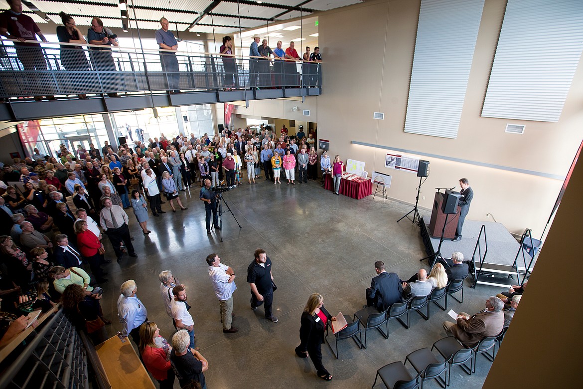 JAKE PARRISH/PressIn the lobby of the new North Idaho College's Parker Technical Education Center, more than 200 listen to NIC President Richard MacLennan speak  at the grand opening ceremony for the Technical Education Center Wednesday evening in Rathdrum.