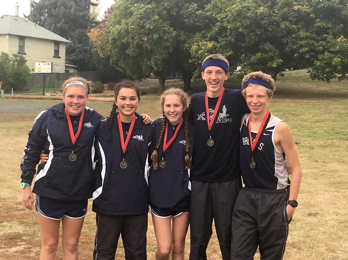 &#151;Photo courtesy TYLER WARNER
A quintet of Bonners Ferry High School runners pose with their medals. Pictured are Jordan Young, Ada Bonnell, Abigail Gorton, Austin Donn and Sam Gorton.