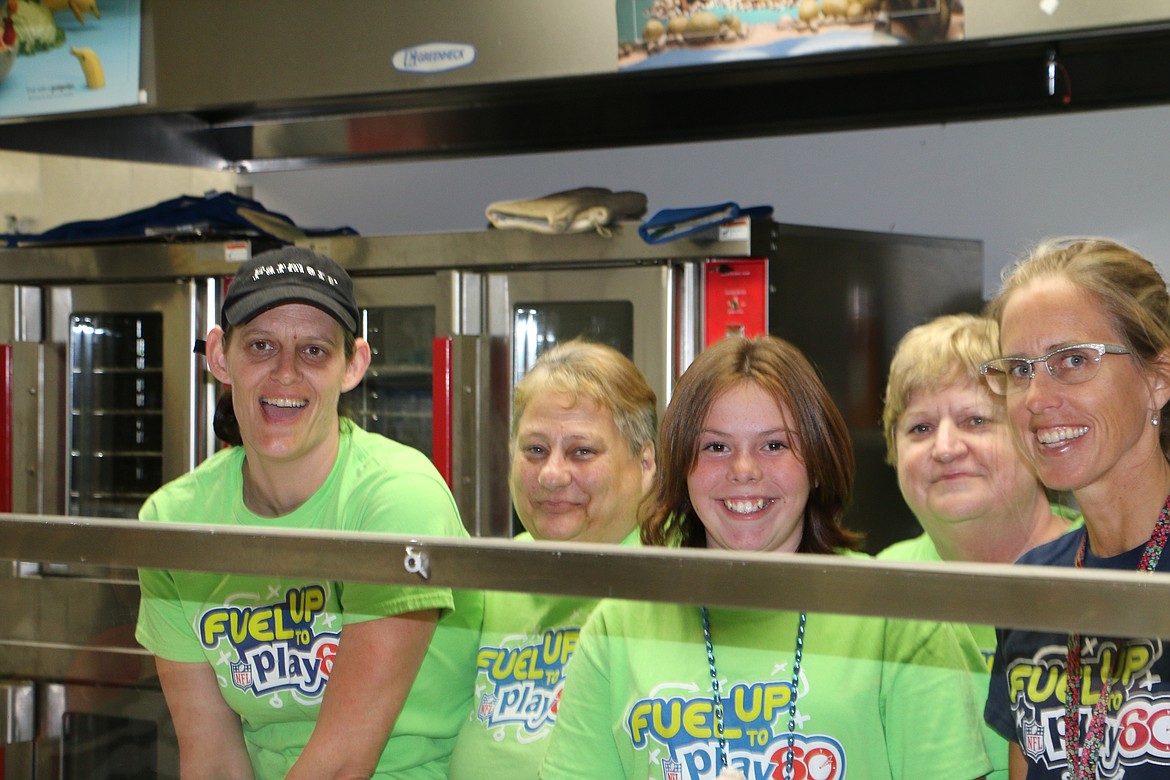 &#151; Photo by MARY MALONE
Kitchen staff donned their Fuel up to Play 60 T-Shirts to serve homemade soup prepared with vegetables from the school garden. The fifth-graders planted the vegetables last year, harvested them last week and helped prepare and serve it Thursday. From left, Angie Hintges, Gayle Lord, 11-year-old Kyla Brown, Cheri Tenney and Teresa Kemink.