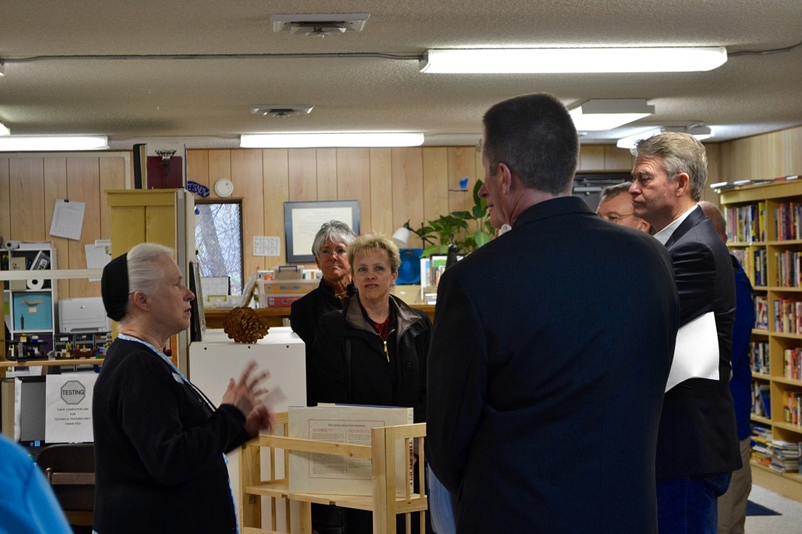 &#151;Photo by SARAH JENKINS
Boundary County Library Director Sandy Ashworth, far left, talks about the FAB Lab to Bonners Ferry Mayor David Sims, Idaho Gov. Butch Otter, Idaho Sen. Shawn Keough and other officals.