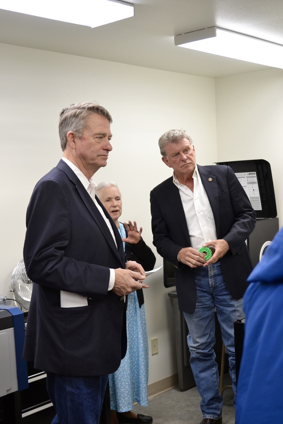 &#151;Photo by SARAH JENKINS
Boundary County Library Director Sandy Ashworth explains the 3D printer to Idaho Lt. Gov. Brad Little and Idaho Gov. C.L. &#147;Butch&#148; Otter during a recent visit to Bonners Ferry.