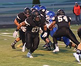 Royal football works on run game in 56-6 romp