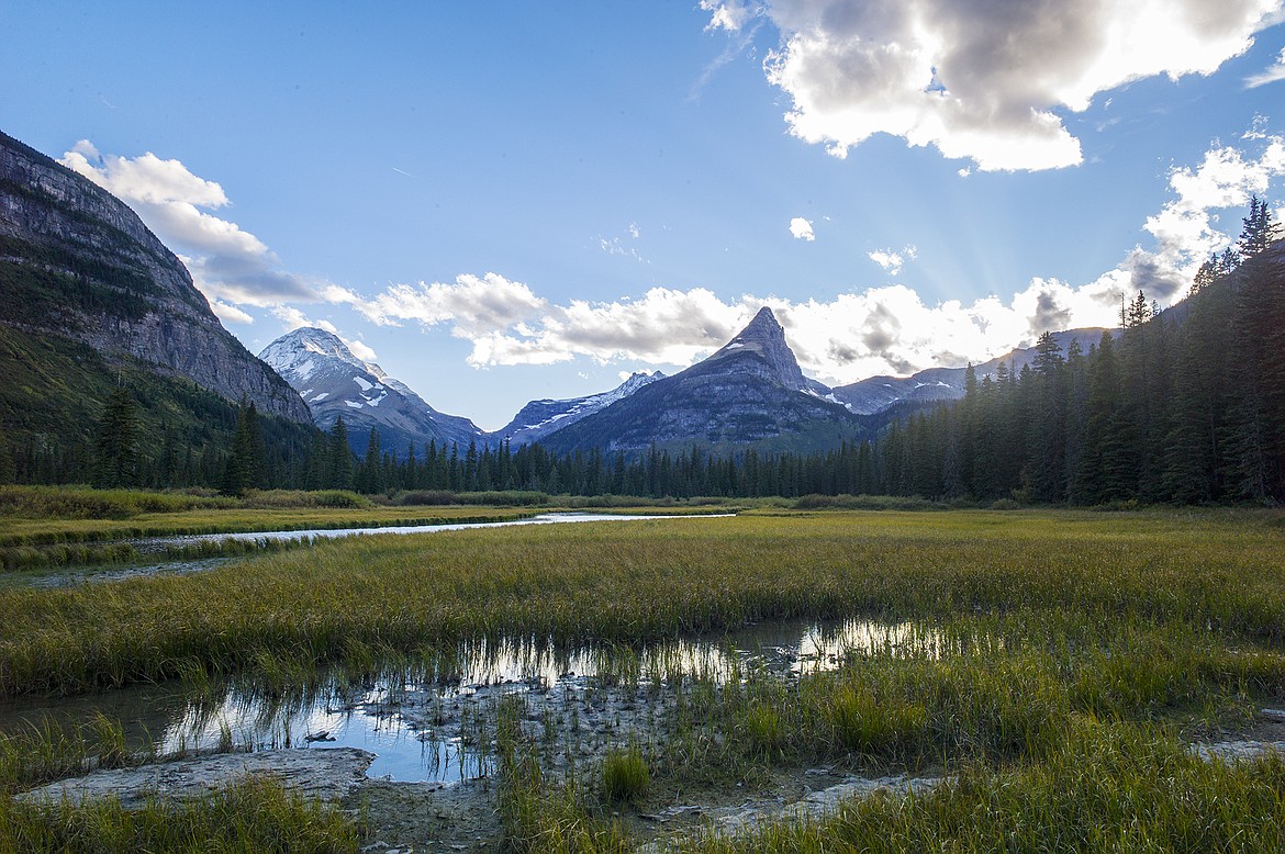 Dusk at the mirror pond, with Fusillade mountain and Mount Jackson, left, in the backcground.