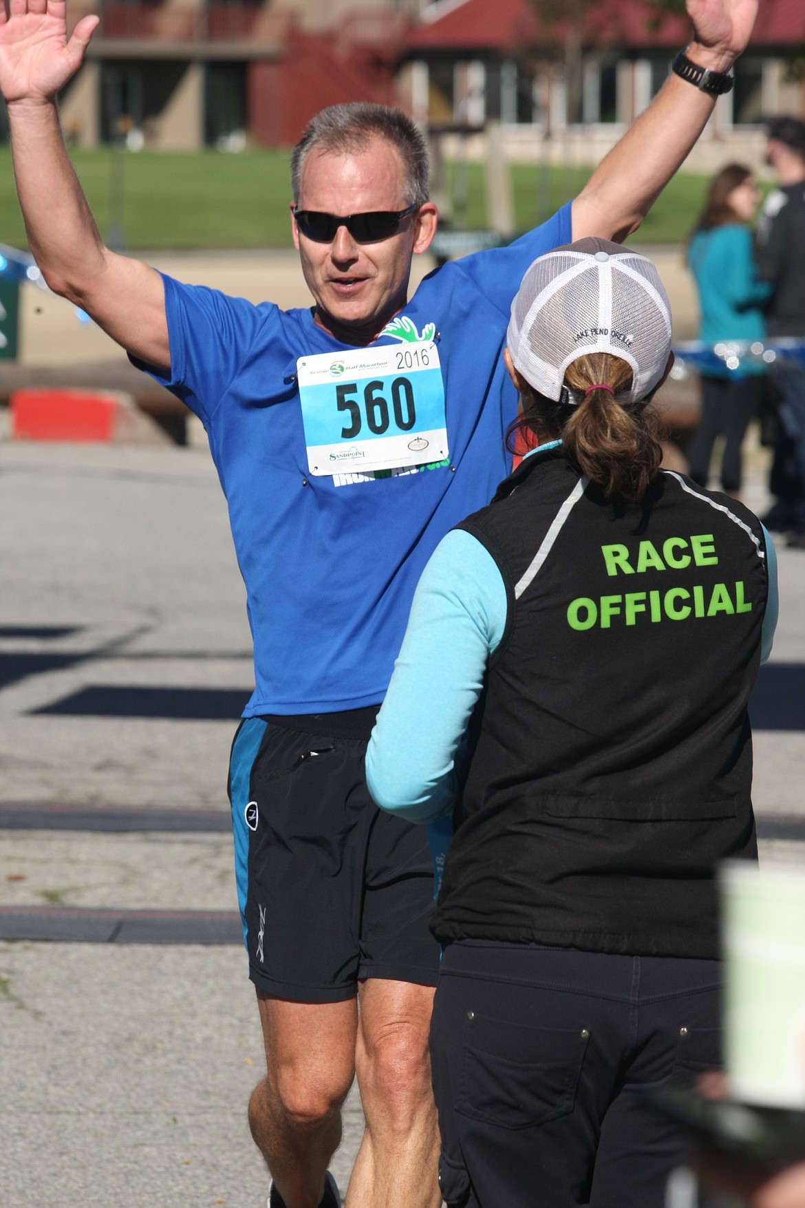 &#151;Photo by JIM McKIERNAN
James Dalton crosses the finish line to celebrate his 60th birthday. Dalton, from Spokane, enjoyed cupcakes following the race, courtesy of the Greater Sandpoint Chamber of Commerce.