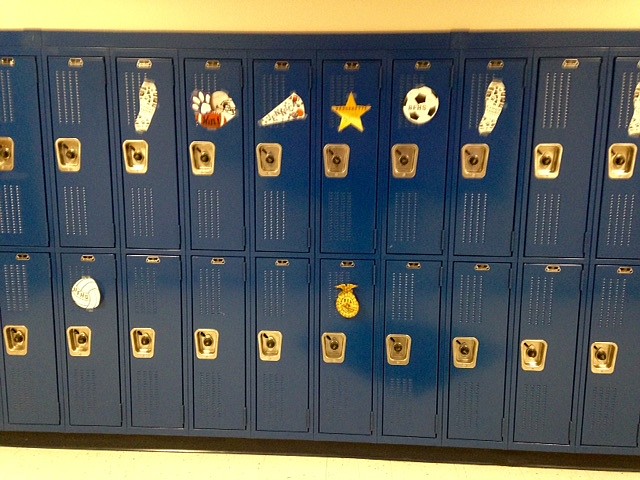 -- Photo by SARAH JENKINS

Newly decorated lockers line the halls at BFHS. All 130 athletes were welcomed back to school with each sport represented. Badger cheerleading squad with assistance from Stephanie Sims hope to raise the level of school spirit.