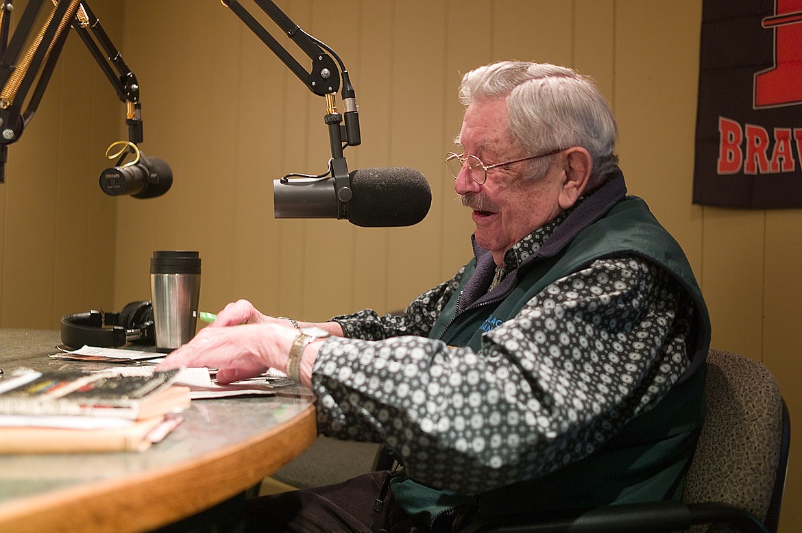 George Ostrom tells a joke during a braodcast at KGEZ radio last week.