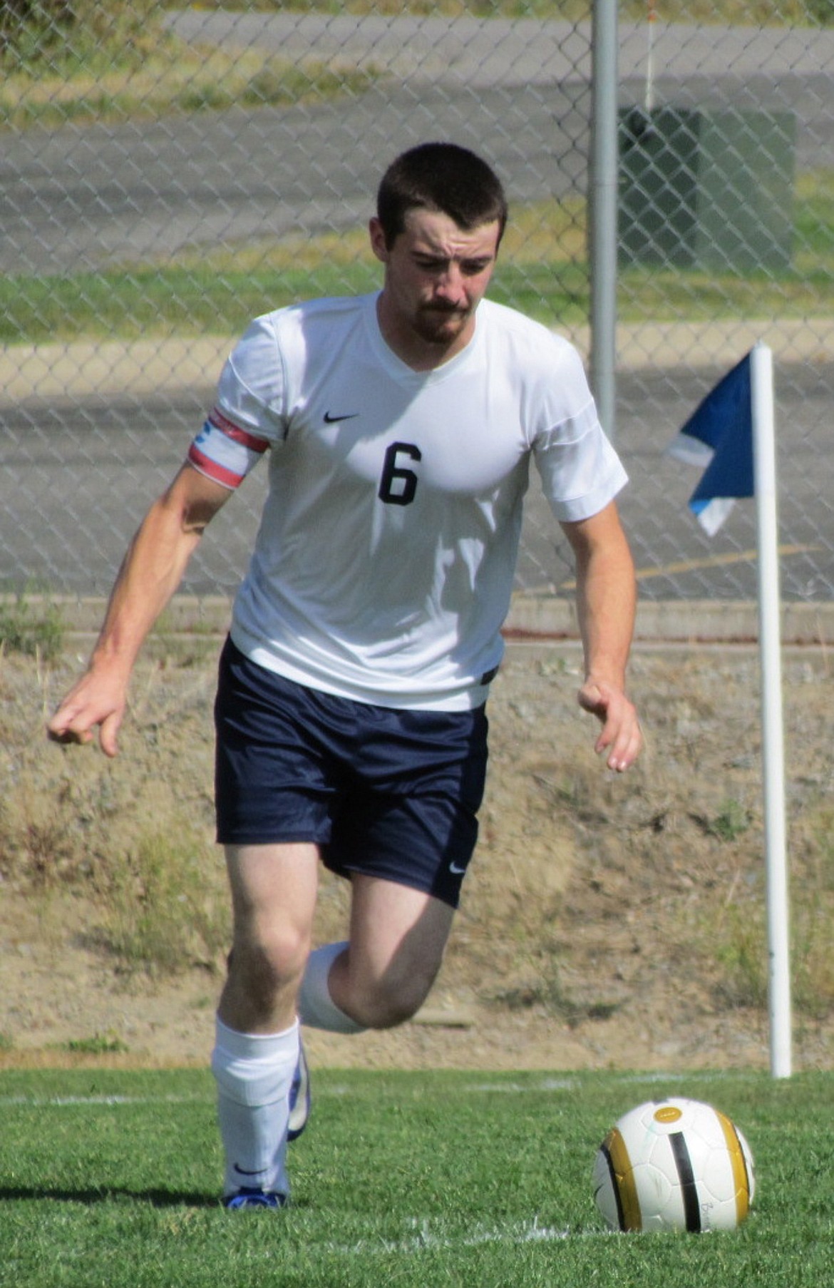 &#151;BONNERS FERRY HERALD FILE PHOTO
Badger Anthony Shutes kicks the ball back into play at a recent soccer match.