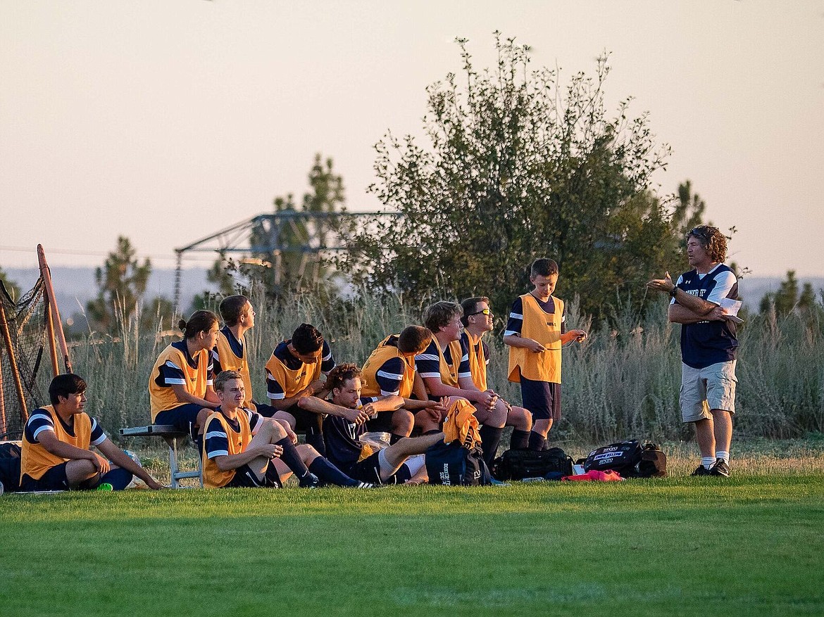 -- Courtesy photo

Coach Wilkerson gives the Badger boys a pep talk during an away game.