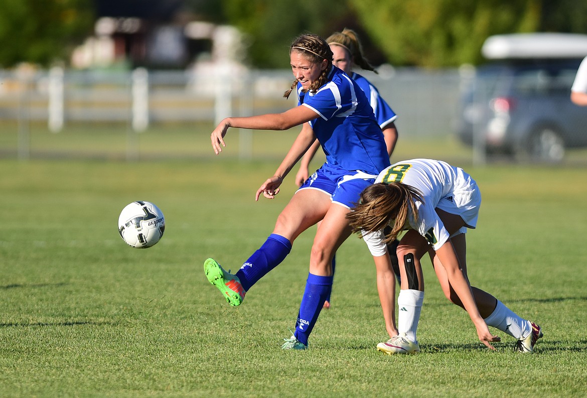 Hannah Gedlaman with a shot against Whitefish last week. (Chris Peterson / Hungry Horse News)