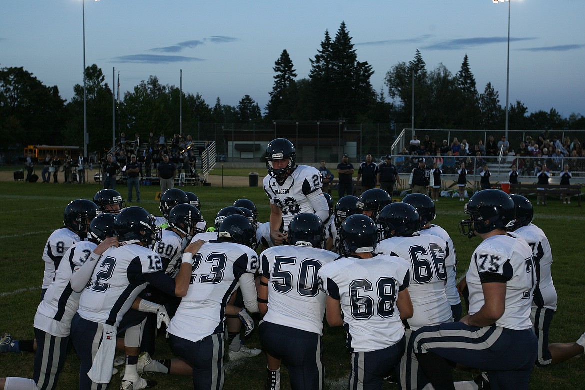 &#151;Photo by ERIC PLUMMER
Senior running back Nick Sabin fires his team up before the game, as the Badgers came out strong in the first quarter.