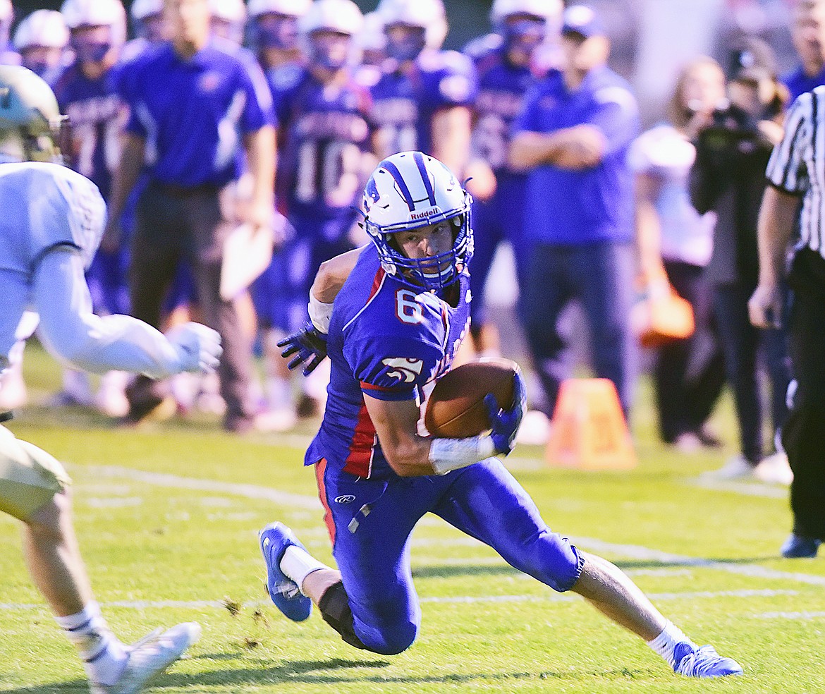 Sean Miller gets around the corner en route to a touchdown in the first half.