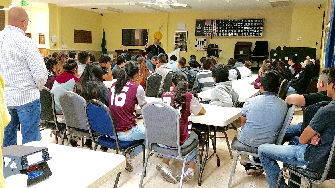 Susie Gruber/Courtesy Photo - Speaking about the importance of aviation to about 30 Wahluke High students, Ken Broda tells his story of flying U-2 Spy Planes for the military. In the foreground is STEM teacher Myron Hamilton.