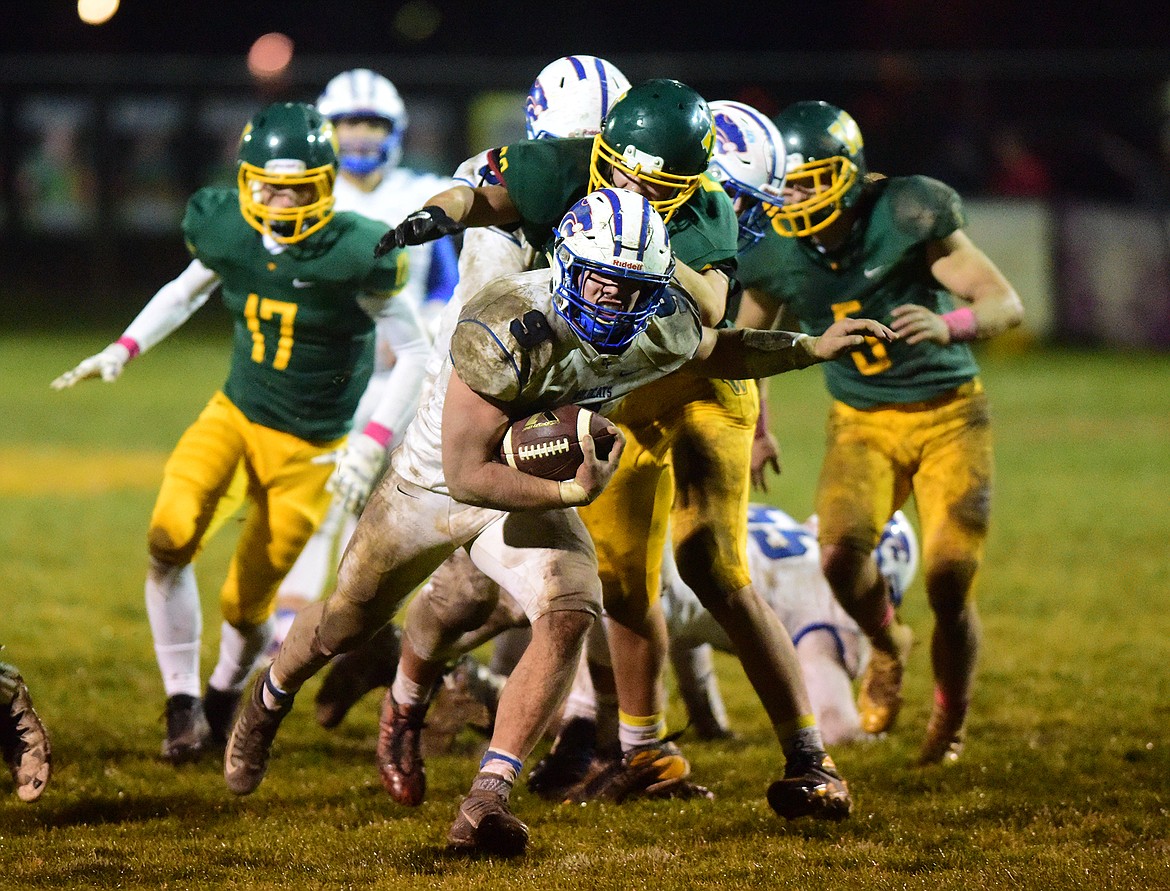 Logan Kolodejchuck rumbles for tough yards against Whitefish last week.