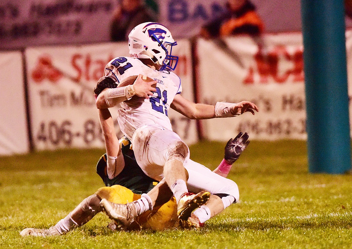 Bryce Fagerland falls in the end zone for the Wildcats final touchdown last week against Whitefish as the Cats won 42-0.