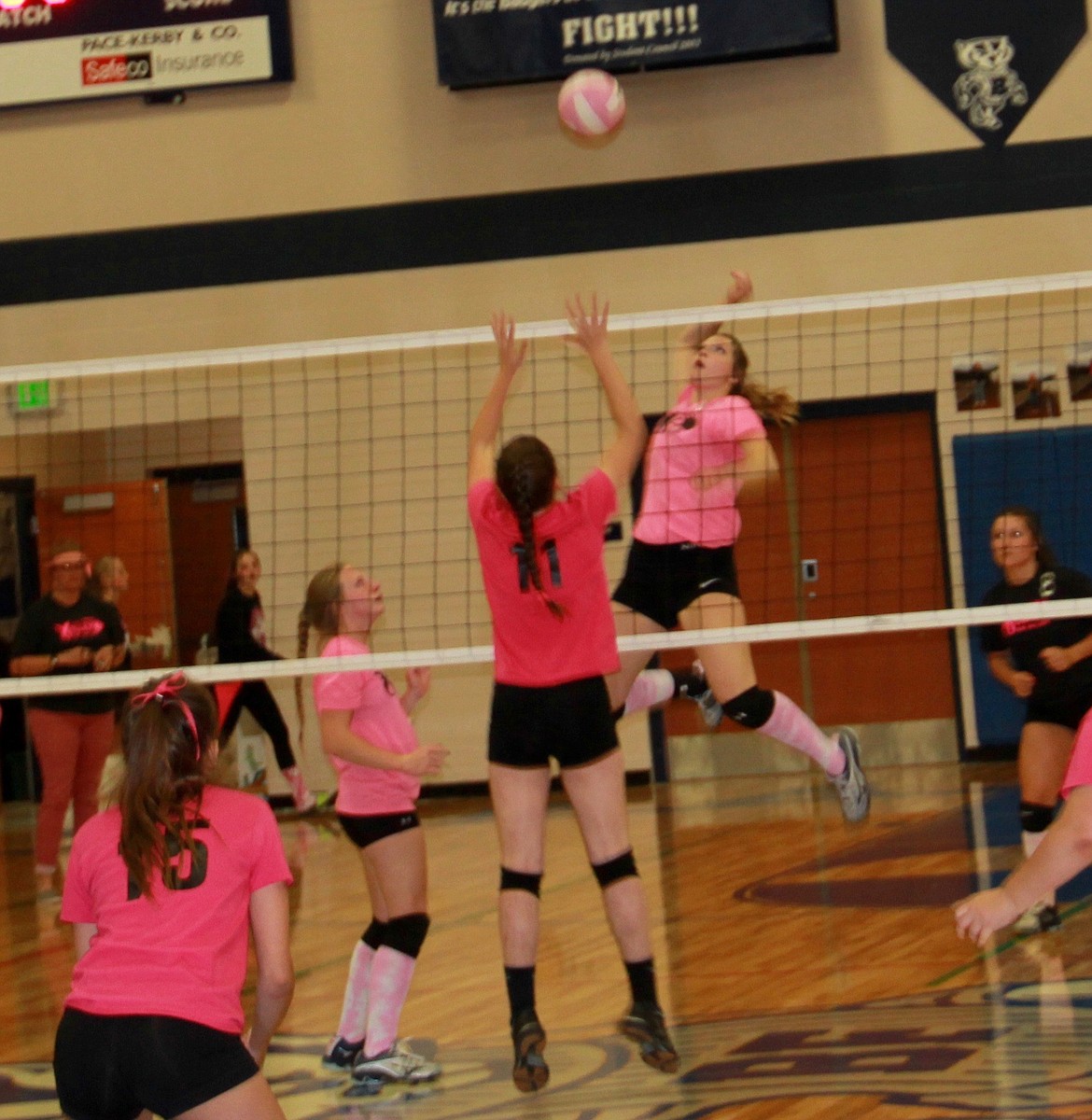 Wenk winds up
 for the spike 

The Lady Badgers had a great turnout at this year&#146;s Volley for the Cure. They beat Clark Fork in four sets, but more importantly they helped raise a substantial sum of money for The Bonners Ferry Women&#146;s Cancer Support and Education Group, which gives vouchers to families and fighters in order for them to make hospital appointments and receive treatments. Bonners Ferry won the first two sets handily, 25-16 and 25-18, lost the third set 18-25, and came back to win the match in the last set 25-20. Bateman had 14 assists and Wenk had 11 kills. Other scoring: Whittaker with 4 aces, Bennett with 15 digs, and Pluid with 4 blocks. Coack Kendra Maas was overjoyed by the amount of fans that came out to support her players as well as the cause. She told the Herald: &#147;We appreciate this community and the support they give us at every game. So, from the bottom of my heart I want to thank them all!&#148;
&#151;Photo by DAC COLLINS