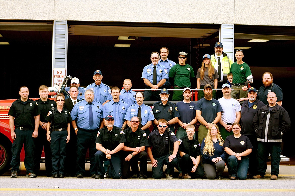 &#151;Photo by STAR SILVA 
Boundary County firefighters and EMS personnel gather on Oct. 9, in front of Bonners Ferry Fire Department, Station 1.
Idaho Department of Lands, Paradise Valley Fire Department, Hall Mountain  Fire Department, North Bench Fire Department, City of Bonners Ferry Fire Department. Boundary Ambulance, U.S. Forest Service, Mayor David Sims.