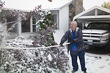 Storm dumps snow, snarls traffic, downs power lines