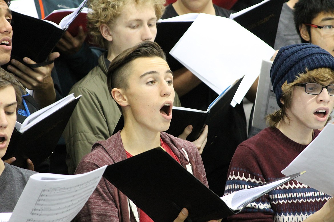 Charles H. Featherstone/Columbia Basin Herald
Moses Lake High School junior Sam Roeber sings as part of the honor choir on Tuesday.