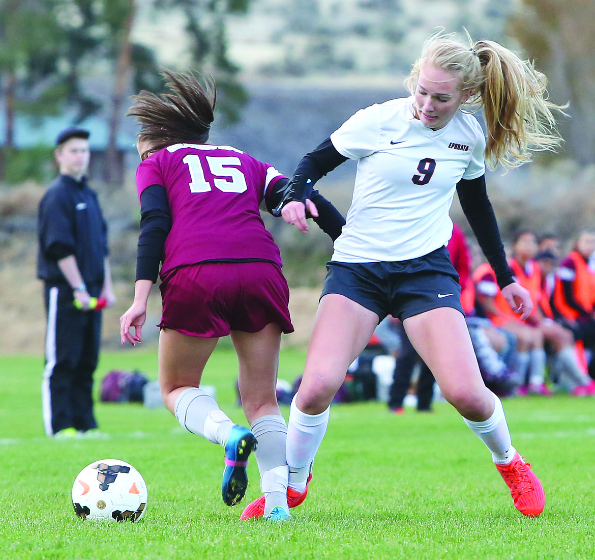 Connor Vanderweyst/Columbia Basin Herald
Ephrata defender Kendall Kemp (9) fights for the ball against Grandview midfielder Guadalupe Ramos.