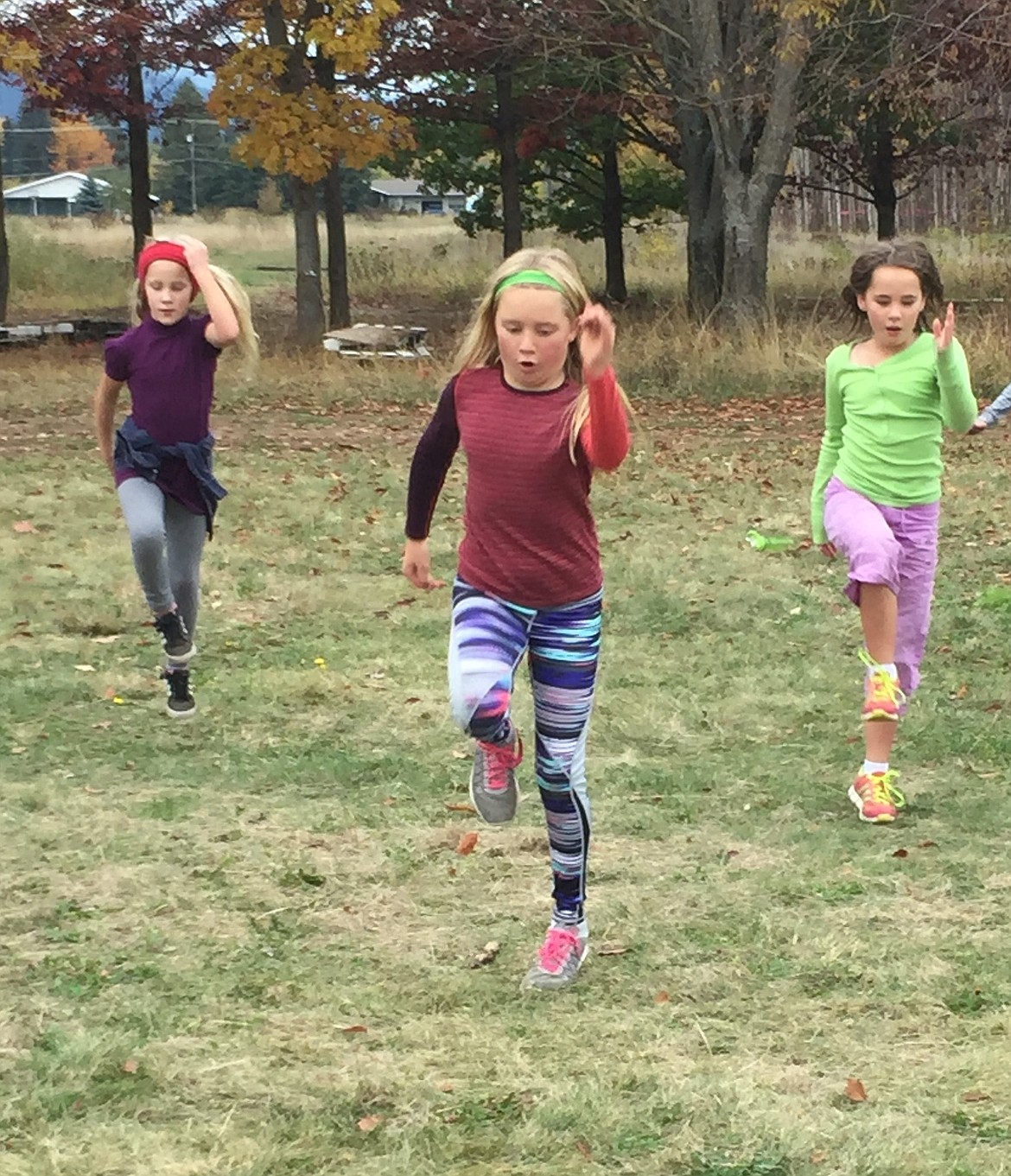 &#151;Courtesy photo
Pictured from left to right are Cecilia Dignan, Berkeley Cox and Sadie Dignan, as the Sandpoint Nordic Club held a Dryland training session recently at the University of Idaho property on Boyer.