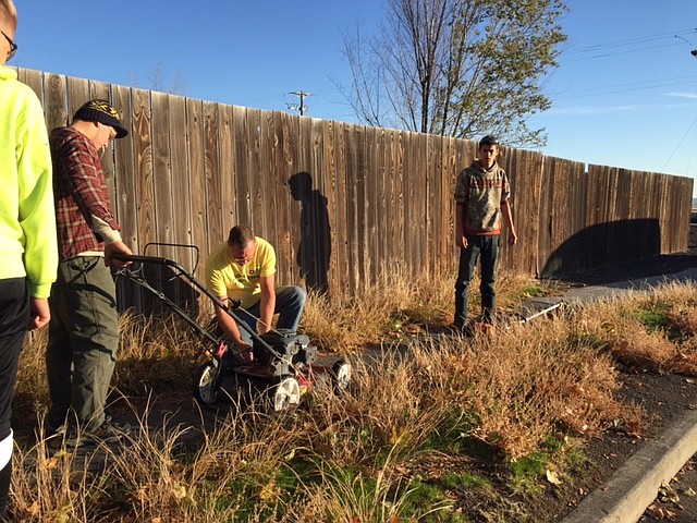 Stephanie Voigt/Columbia Basin Herald
Students from Moses Lake Christian Academy begin an early morning cleanup in the Larson community on Wednesday.