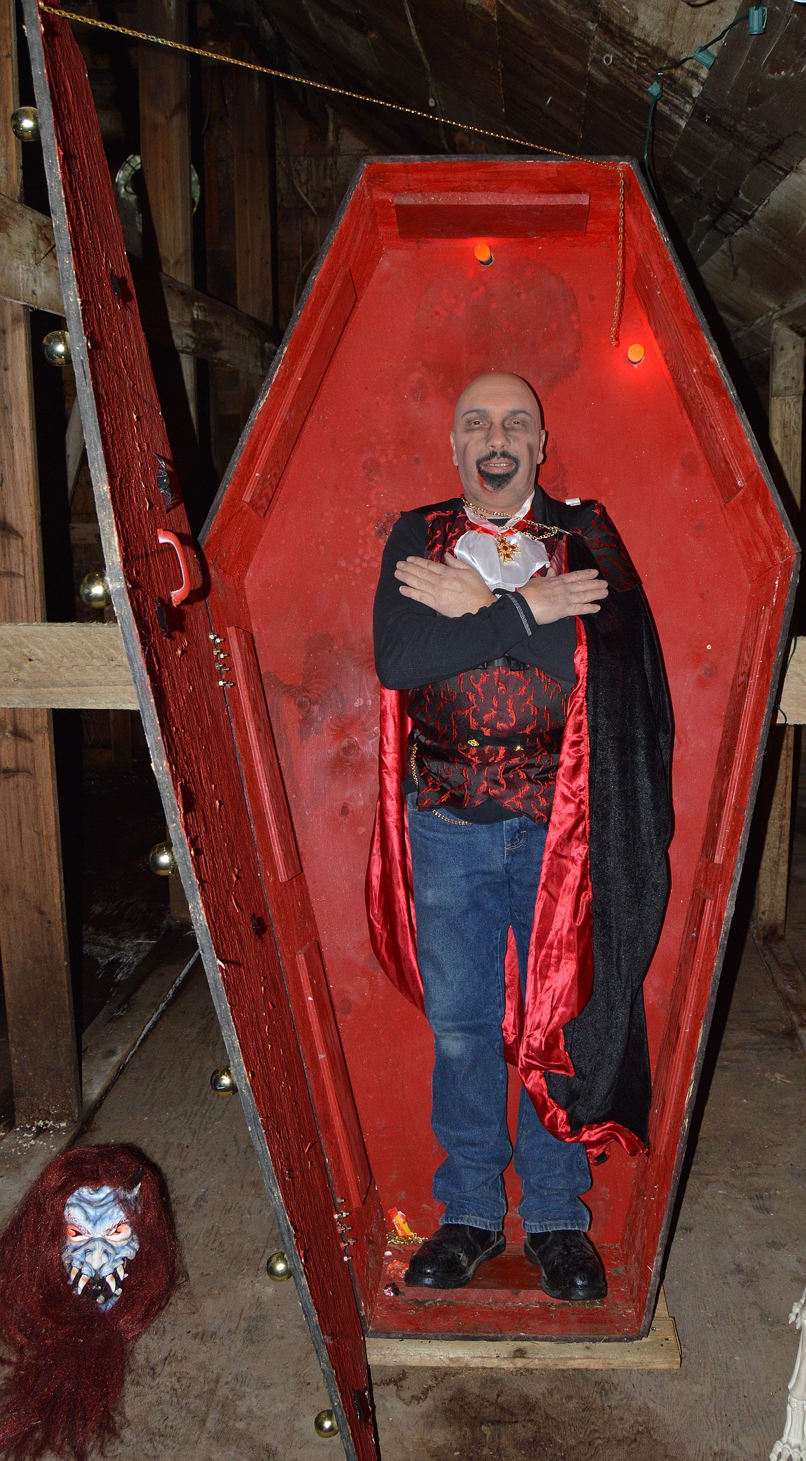 Rob Dunning awaits visitors in his coffin at hte end of the haunted house tour (Anna Arvidson photo).