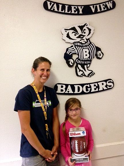 &#151;Courtesy photo
Valley View PE teacher, Mrs. Petesch, awards October's Family Fitness Challenge winner, third-grader, Mary Moon!