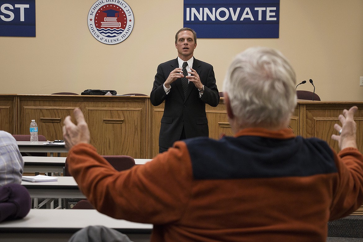 Ron Deady, right, whose grandkids currently attend Idaho public schools, talks about the importance of parent involvement in public education with Blake Youde, left, a representative from the Idaho State Board of Education.

&shy;&shy;&#151;Photo by 
BETHANY BLITZ