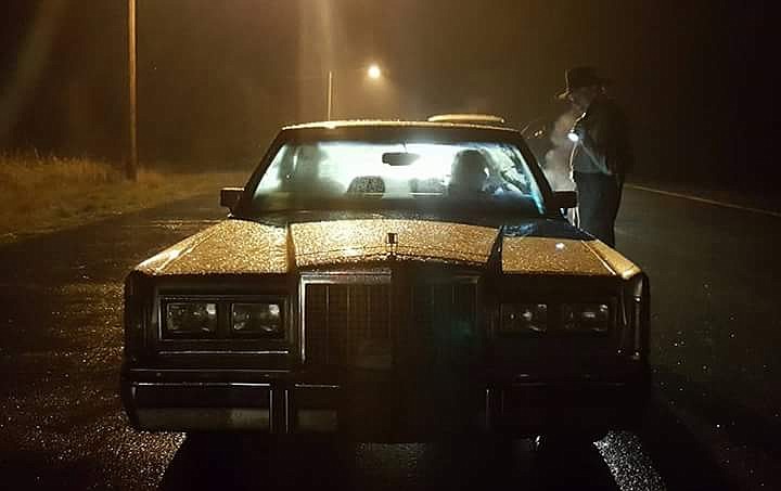 &#151;Courtesy Photo
Brian Sutherland (Aldous Lennon Balfour), left, Jeffrey Arrington (Jeffrey Lambert), center, and  Dennis Fitzpatrick (the Sheriff), right, situated off HWY-95 in Boundary County during the filming of Riders On The Storm.