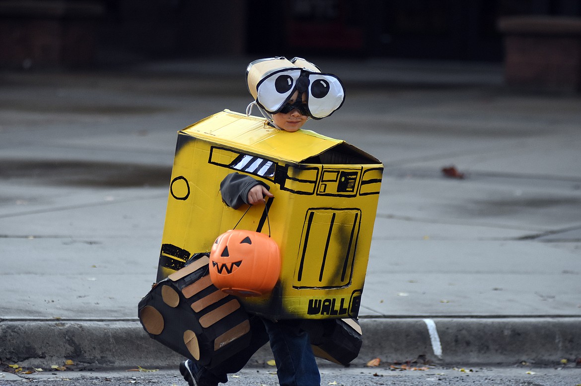 Children in costume filled Central Avenue Monday trick-or-treating at downtown businesses for Halloween.