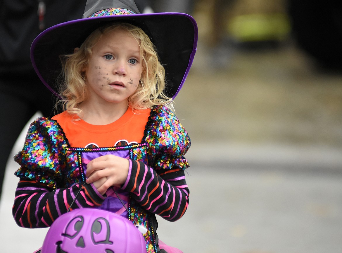 Children in costume filled Central Avenue Monday trick-or-treating at downtown businesses for Halloween.