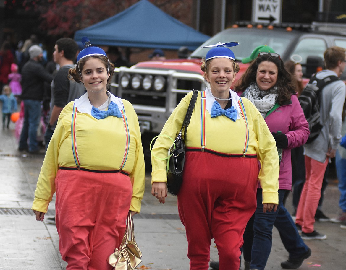 Children in costume filled Central Avenue Monday trick-or-treating at downtown businesses for Halloween.