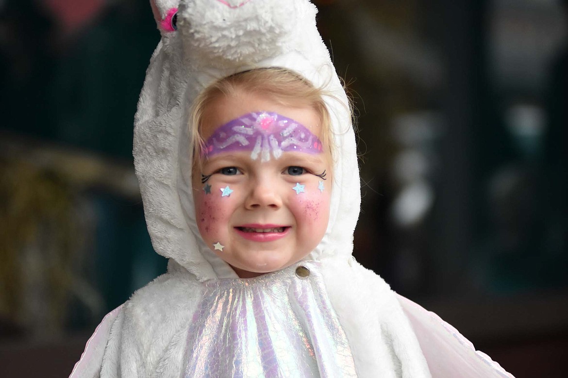 Children in costume filled Central Avenue Monday trick-or-treating at downtown businesses for Halloween.