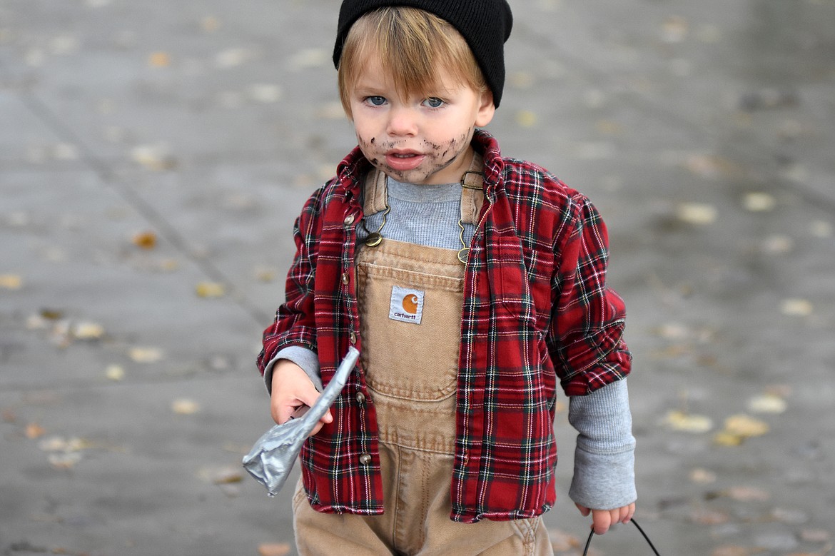 Children in costume filled Central Avenue Monday trick-or-treating at downtown businesses for Halloween.