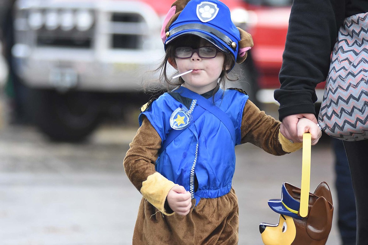 Children in costume filled Central Avenue Monday trick-or-treating at downtown businesses for Halloween.