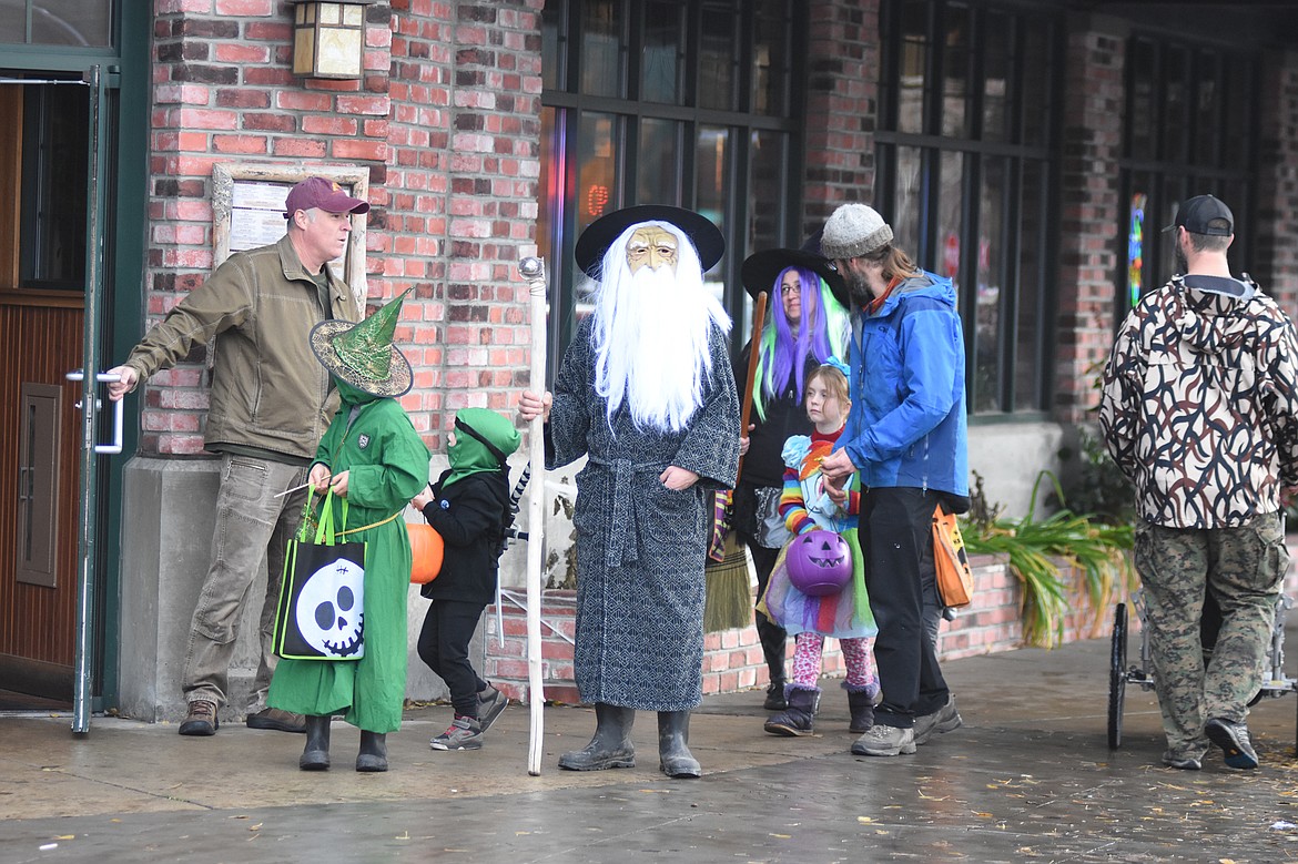 Children in costume filled Central Avenue Monday trick-or-treating at downtown businesses for Halloween.