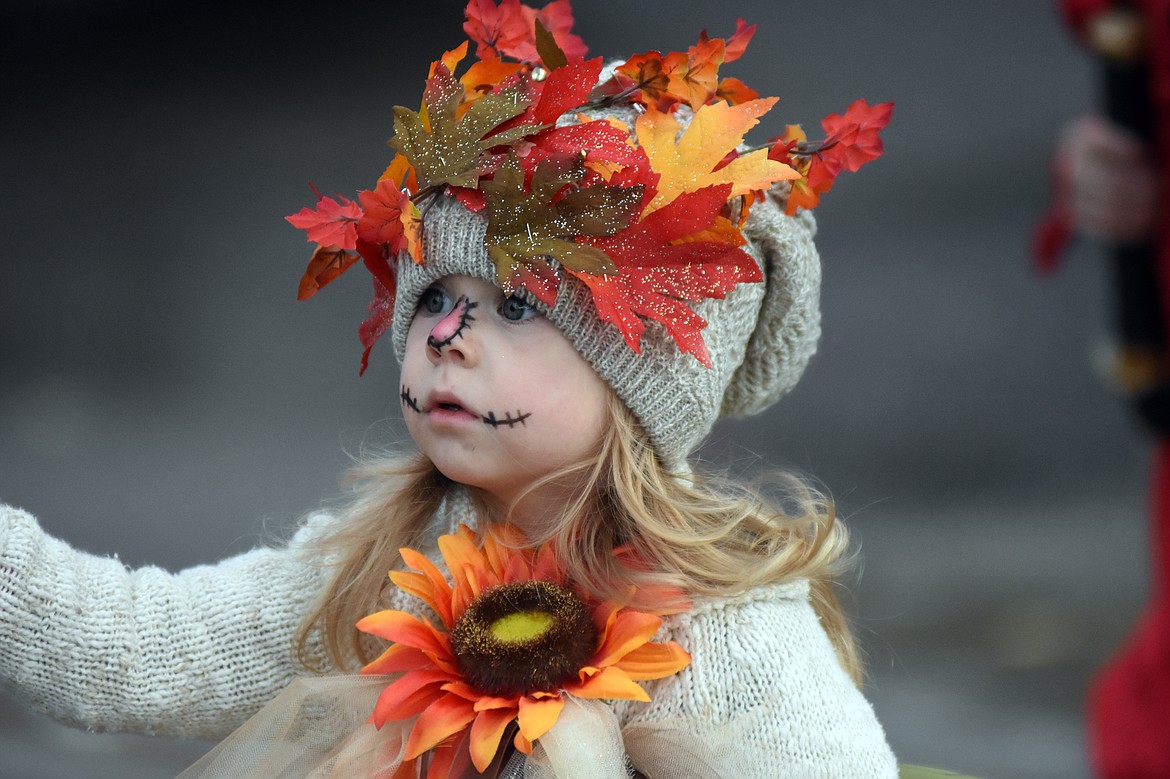 Children in costume filled Central Avenue Monday trick-or-treating at downtown businesses for Halloween.