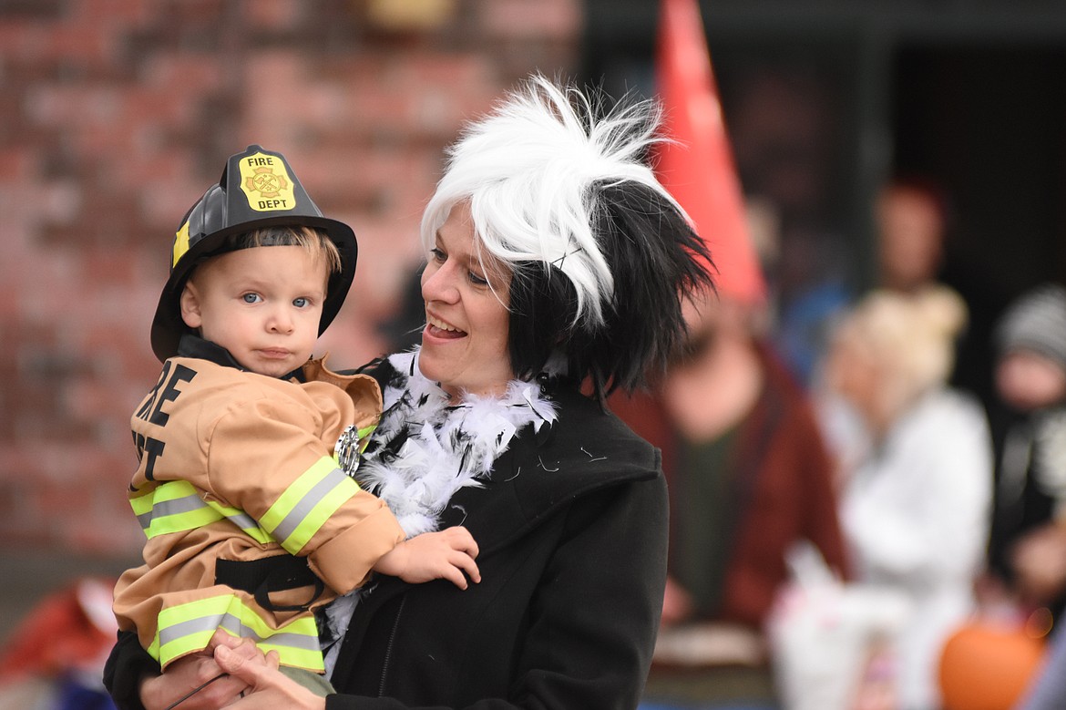 Children in costume filled Central Avenue Monday trick-or-treating at downtown businesses for Halloween.