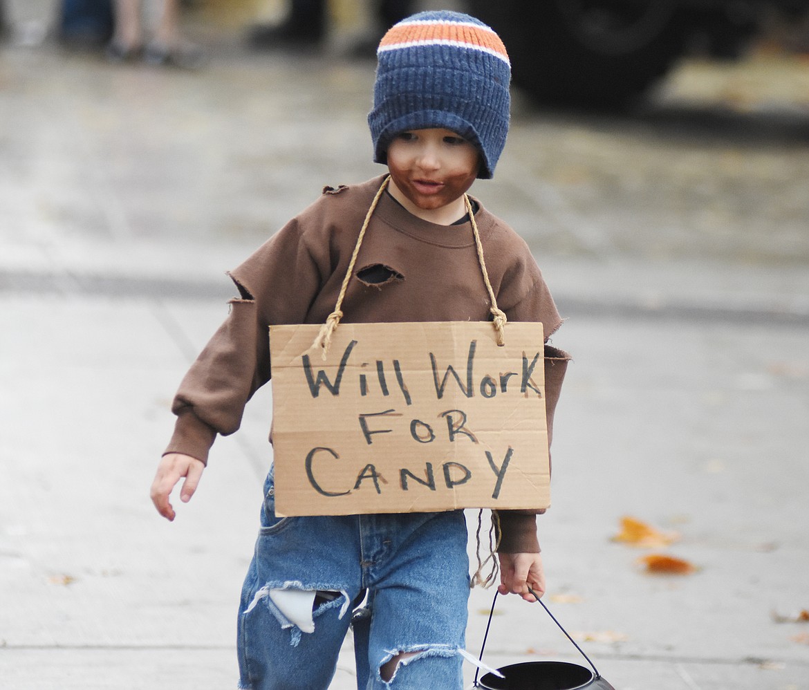 Children in costume filled Central Avenue Monday trick-or-treating at downtown businesses for Halloween.