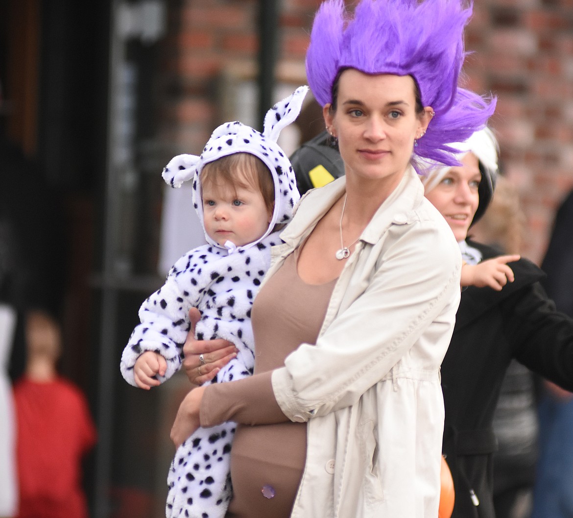 Children in costume filled Central Avenue Monday trick-or-treating at downtown businesses for Halloween.