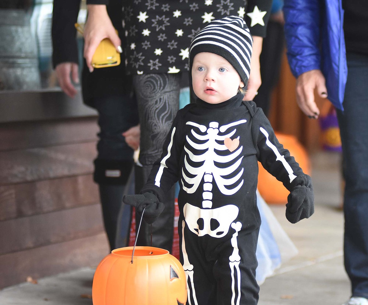 Children in costume filled Central Avenue Monday trick-or-treating at downtown businesses for Halloween.